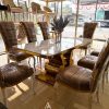 Meja Makan 8 Kursi Stainless Gold Top Marmer Carara