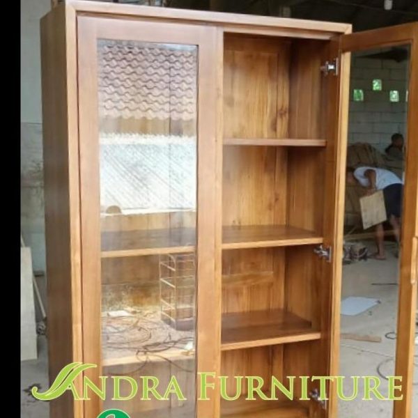 Almari buku kaca 2 pintu minimalis 2 laci kayu jati.